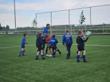 Laatste training S.K.N.W.K. JO10-1 (partijtje tegen de ouders) van woensdag 22 mei 2024 (12/133)